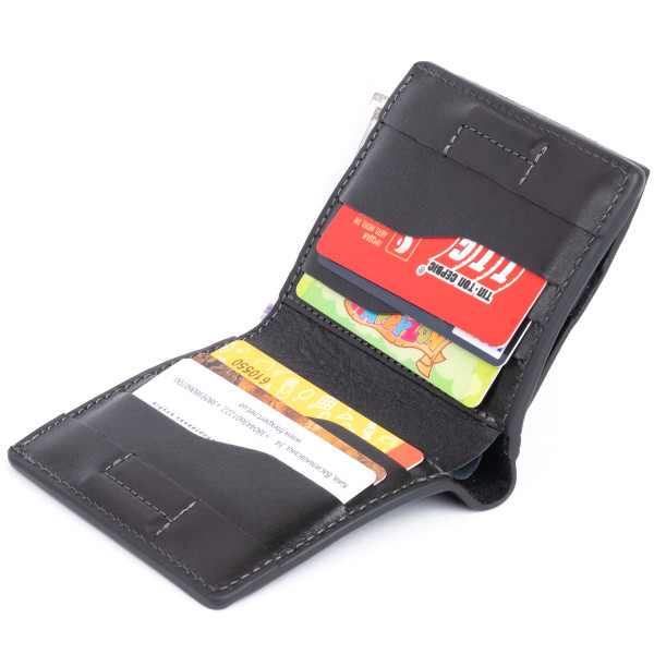 Вертикальное глянцевое портмоне с накладной монетницей GRANDE PELLE 11329 Черное